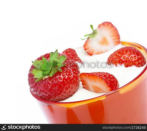 Ripe strawberry with cream on a white background