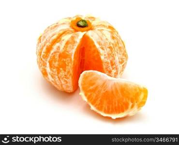 Ripe tangerines lie on a white background