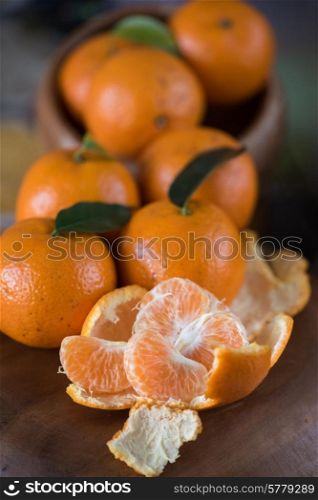 Ripe tangerines on wooden background. tangerines