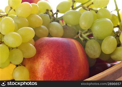 Ripe tasty fruits lies in basket