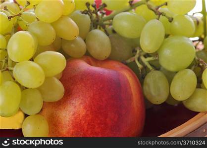 Ripe tasty fruits lies in basket