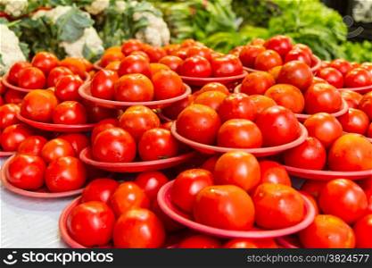Ripe tomatoes at a traditional market
