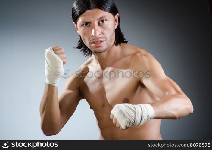 Ripped martial arts expert at training