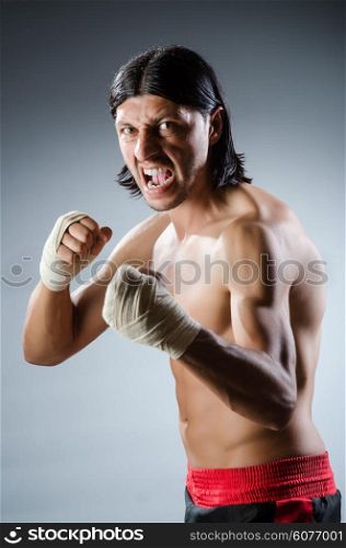 Ripped martial arts expert at training