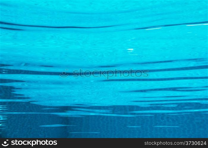 Ripple shooting from underwater in the swimming pool