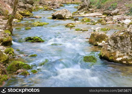 ripples and cascades on spring mountain river (Kokkozka River, Great Crimean Canyon, Ukraine). Long term exposure.