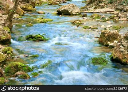 ripples and cascades on spring mountain river (Kokkozka River, Great Crimean Canyon, Ukraine). Long term exposure.