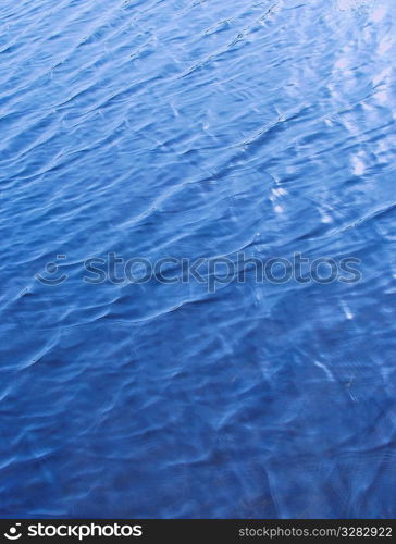 Ripples in blue water.