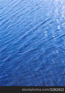 Ripples in blue water.