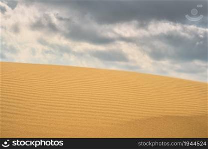 Ripples on the sand dunes on the Black Sea coast. Close-up sand dune for background, banner for summer.