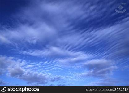 Rippling Clouds In Blue Sky