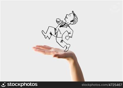 Risk in business. Caricature of businessman running on human hand