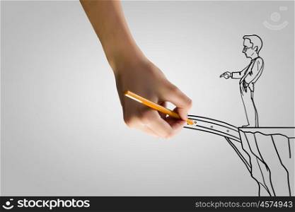 Risk in business. Human hand drawing caricature of man and bridge above gap