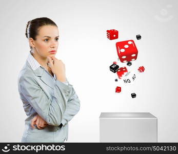 Risk in business. Image of thoughtful businesswoman looking for answer