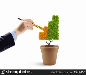 Risk in investment. Close up image of human hand painting plant shaped like graph