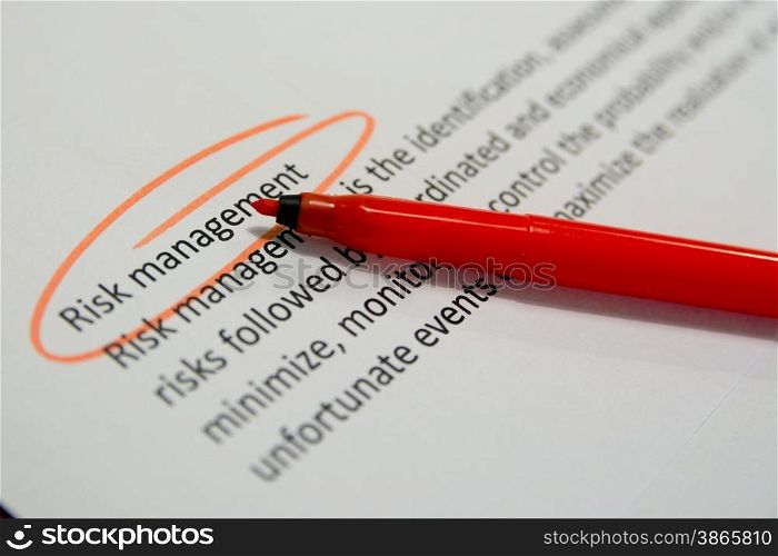 risk management circled text with red pen