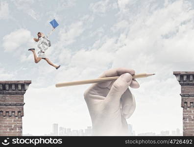 Risky business. Young businesswoman jumping over gap. Risk concept