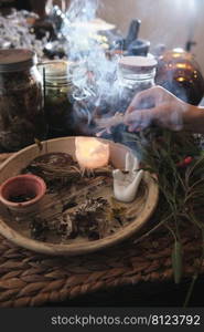 Ritual of burning dry herbs. Shamanic ritual, alternative medicine, herbal treatment. 