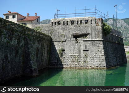 River and wall of Old town Kotor in Montenegro