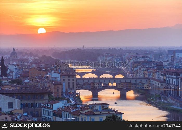 River Arno and famous bridge Ponte Vecchio at sunset from Piazzale Michelangelo in Florence, Tuscany, Italy