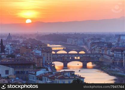 River Arno and famous bridge Ponte Vecchio at sunset from Piazzale Michelangelo in Florence, Tuscany, Italy