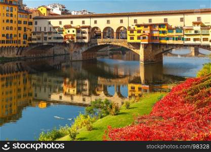 River Arno and Ponte Vecchio in Florence, Italy. River Arno and famous bridge Ponte Vecchio in the sunny morning in Florence, Tuscany, Italy