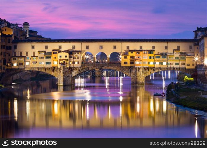 River Arno and Ponte Vecchio in Florence, Italy. River Arno and famous bridge Ponte Vecchio at sunset in Florence, Tuscany, Italy