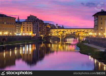River Arno and Ponte Vecchio in Florence, Italy. River Arno and famous bridge Ponte Vecchio at gorgeous sunset in Florence, Tuscany, Italy