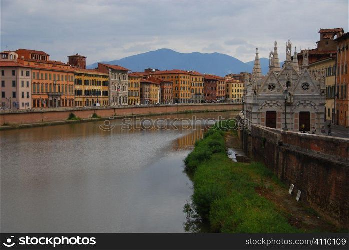River Arno flows through Pisa, Italy, Tuscany,