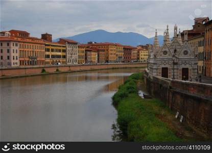 River Arno flows through Pisa, Italy, Tuscany,