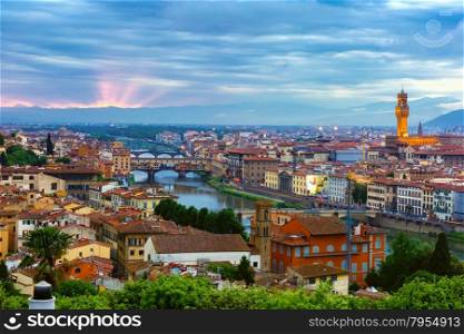 River Arno with bridge Ponte Vecchio and Palazzo Vecchio at sunset from Piazzale Michelangelo in Florence, Tuscany, Italy