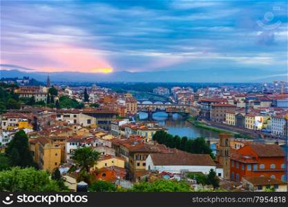River Arno with bridge Ponte Vecchio at sunset from Piazzale Michelangelo in Florence, Tuscany, Italy