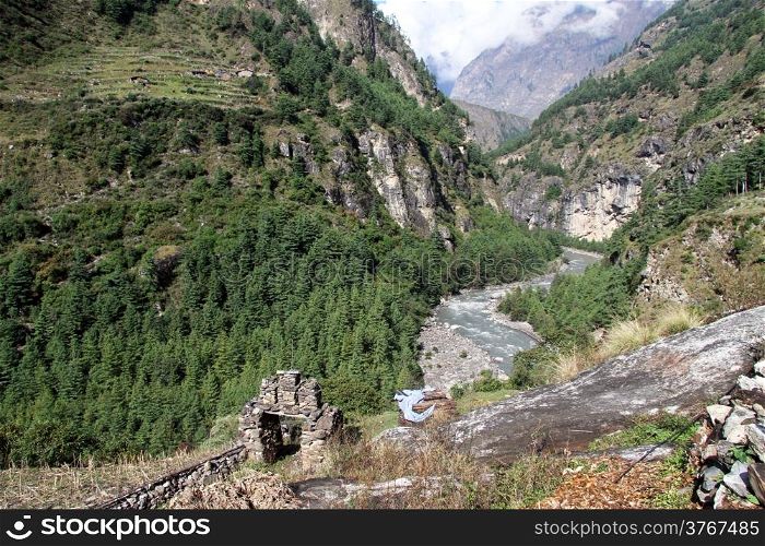 River Budhi Gandaki Nadi and gate of village in Nepal