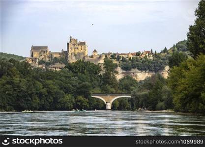 river dordogne and the village of beynac et cazenac with its medieval castle on the cliff