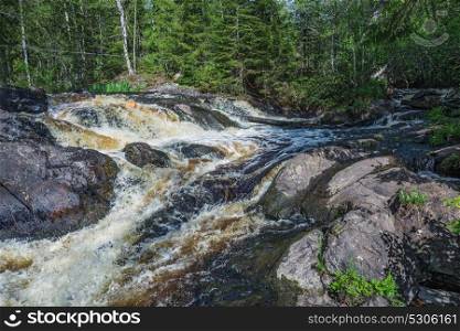 River flow in the forest. River flow in the Karelian forest