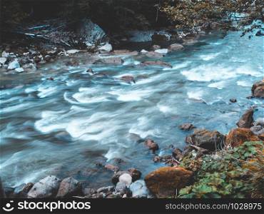 River flowing in mountain from Ryu Sei waterfall, Hokkaido, japan. Nature landscape.