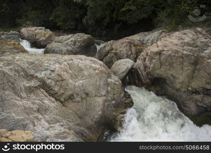 River flowing through rocks in forest, Yelapa, Jalisco, Mexico