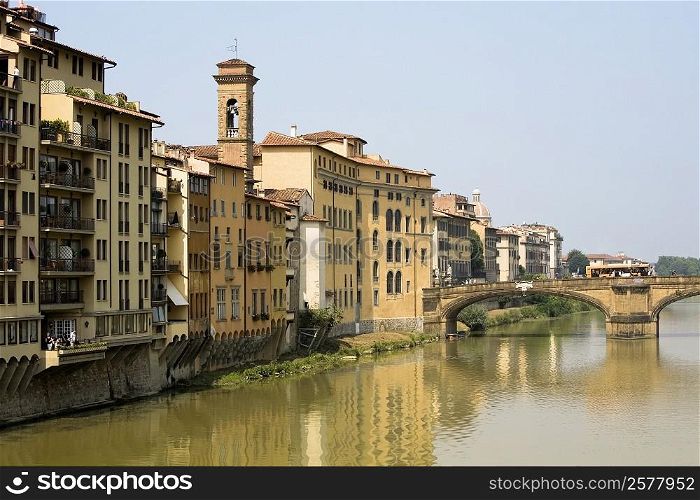 River in front of buildings, Ponte Alle Grazie, Arno River, Florence, Tuscany, Italy