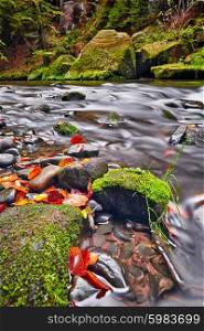 river Kamenice in autumn with long exposure, Bohemian Switzerland, Czech Republic