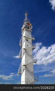 river lighthouse on cloudy background