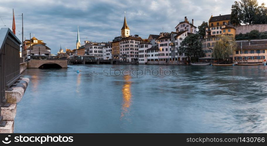 River Limmat with Fraumunster and Church of St Peter in the morning in Old Town of Zurich, the largest city in Switzerland. Zurich, the largest city in Switzerland