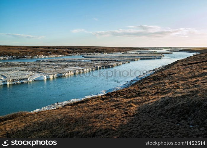 River near Urridafoss waterfall in southwest Iceland in a sunny day. River near Urridafoss waterfall, Iceland