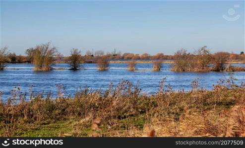 River nearly overflowing after heavy rain near Ely