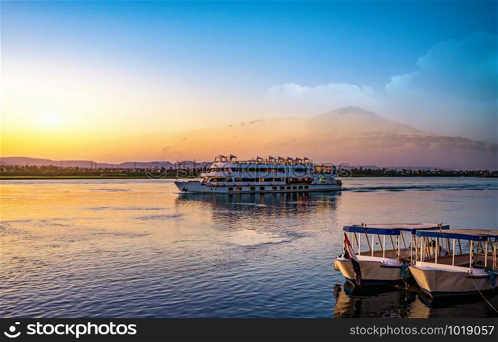 River Nile and ship at sunset in Aswan