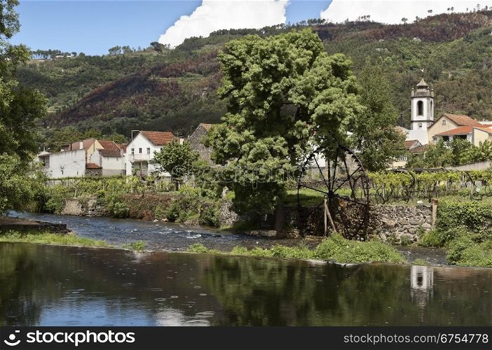 River passing by a small village in central Portugal