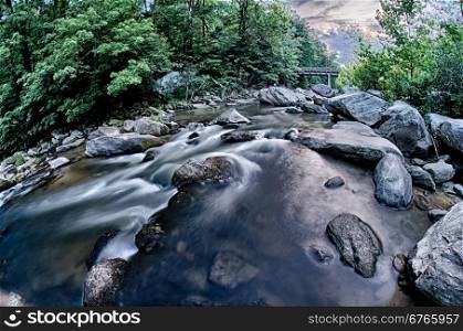 river stream flowing over rocks