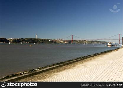 River Tagus is the longest river in the Iberian Peninsula emptying into the Atlantic Ocean near Lisbon.