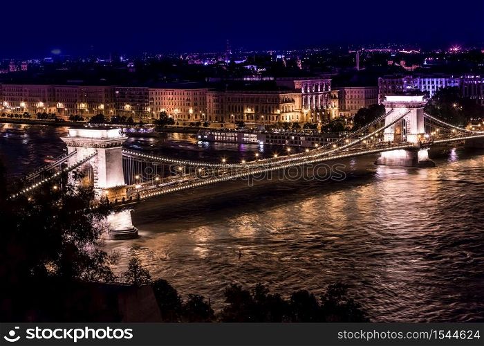 River view of Budapest at evening, illuminated Chain Bridge