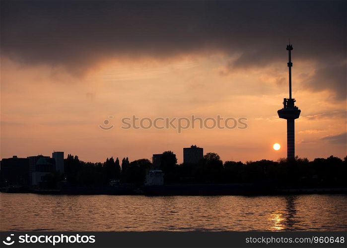 River view of the Rotterdam skyline at sunset, on the right Euromast Tower, Netherlands, South Holland province.