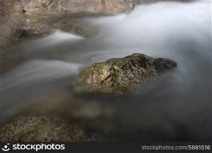 river waterfall detail among rocks, portuguese national park